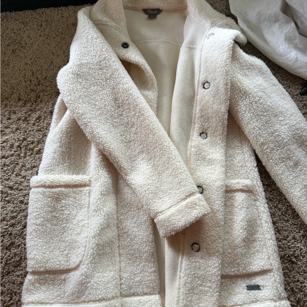 mid-length white fur coat